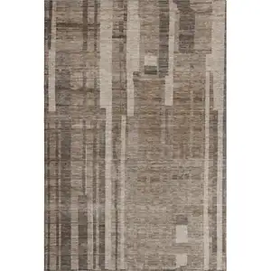 Photo of Brown And Taupe Striped Washable Area Rug With UV Protection
