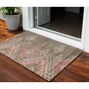 Photo of Brown And Terra Cotta Southwestern Washable Indoor Outdoor Area Rug
