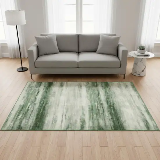 Green And Ivory Abstract Washable Area Rug Photo 1