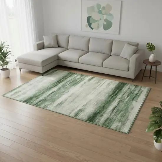 Green And Ivory Abstract Washable Area Rug Photo 1