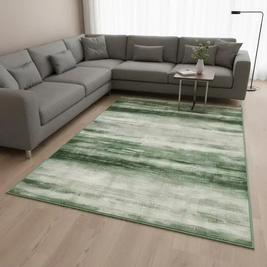 Green And Ivory Abstract Washable Area Rug Photo 1