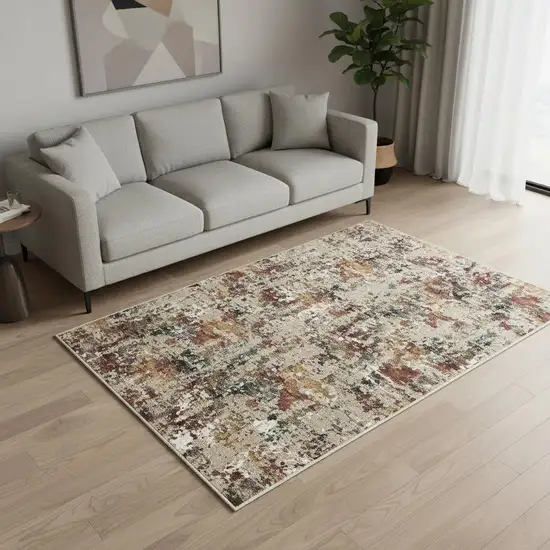 Beige Red And Ivory Abstract Washable Area Rug Photo 1