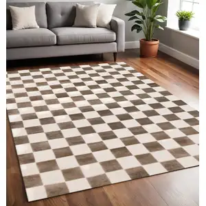 Photo of Brown And White Geometric Area Rug