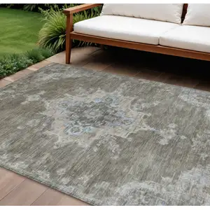 Photo of Brown Beige And Blue Medallion Washable Indoor Outdoor Area Rug