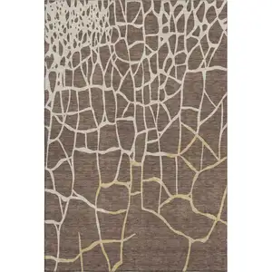 Photo of Brown Beige And Gold Abstract Geometric Washable Area Rug With UV Protection