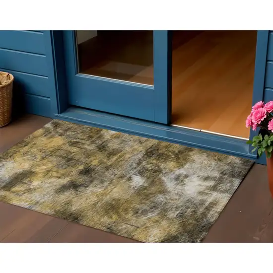 Brown Beige And Gold Abstract Washable Indoor Outdoor Area Rug Photo 1