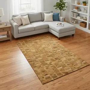 Photo of Brown Beige And Gold Geometric Washable Area Rug With UV Protection