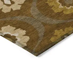 Photo of Brown Beige And Gold Medallion Washable Indoor Outdoor Area Rug