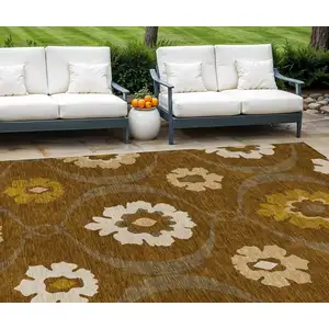 Photo of Brown Beige And Gold Medallion Washable Indoor Outdoor Area Rug