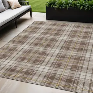 Photo of Brown Beige And Gold Plaid Washable Indoor Outdoor Area Rug