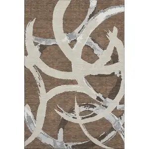Photo of Brown Beige And Gray Abstract Washable Area Rug With UV Protection