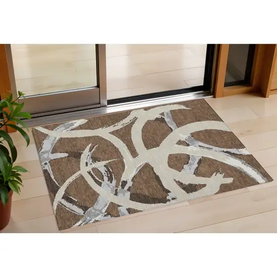 Brown Beige And Gray Abstract Washable Indoor Outdoor Area Rug Photo 1
