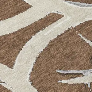 Photo of Brown Beige And Gray Abstract Washable Indoor Outdoor Area Rug