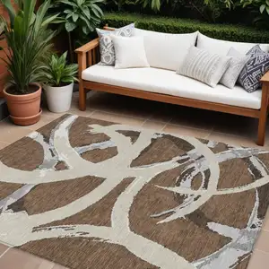 Photo of Brown Beige And Gray Abstract Washable Indoor Outdoor Area Rug