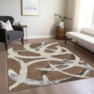 Photo of Brown Beige And Gray Abstract Washable Indoor Outdoor Area Rug