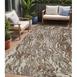 Photo of Brown Beige And Gray Abstract Washable Indoor Outdoor Area Rug
