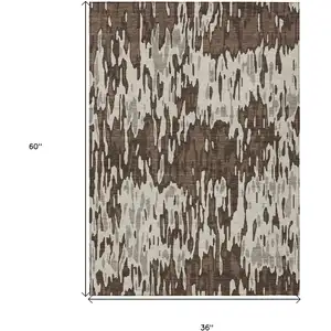 Photo of Brown Beige And Gray Striped Washable Indoor Outdoor Area Rug