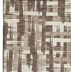Photo of Brown Beige And Ivory Abstract Geometric Washable Area Rug With UV Protection