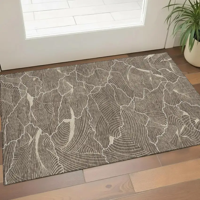 Brown Beige And Ivory Abstract Washable Area Rug With UV Protection Photo 1