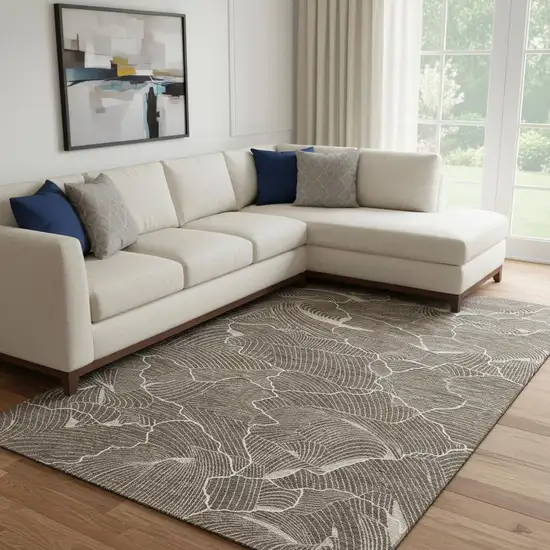 Brown Beige And Ivory Abstract Washable Area Rug With UV Protection Photo 2