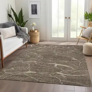 Photo of Brown Beige And Ivory Abstract Washable Area Rug With UV Protection