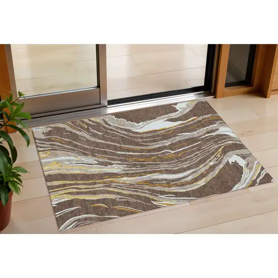 Brown Beige And Ivory Abstract Washable Indoor Outdoor Area Rug Photo 1