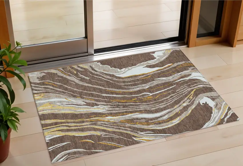 Brown Beige And Ivory Abstract Washable Indoor Outdoor Area Rug Photo 1