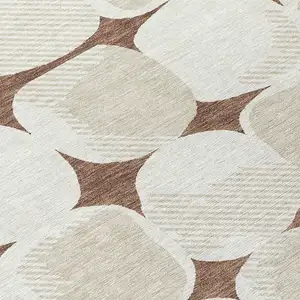 Photo of Brown Beige And Ivory Abstract Washable Indoor Outdoor Area Rug