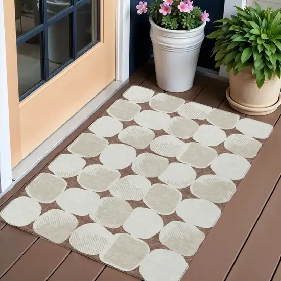 Brown Beige And Ivory Abstract Washable Indoor Outdoor Area Rug Photo 1