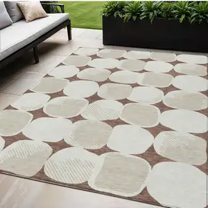 Photo of Brown Beige And Ivory Abstract Washable Indoor Outdoor Area Rug