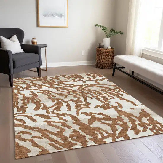 Brown Beige And Ivory Animal Print Washable Indoor Outdoor Area Rug Photo 9