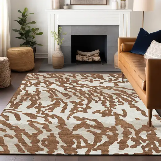 Brown Beige And Ivory Animal Print Washable Indoor Outdoor Area Rug Photo 9