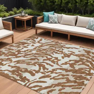 Photo of Brown Beige And Ivory Animal Print Washable Indoor Outdoor Area Rug