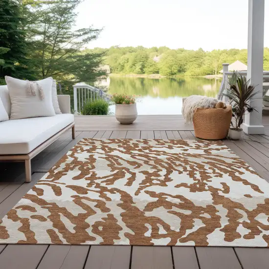 Brown Beige And Ivory Animal Print Washable Indoor Outdoor Area Rug Photo 8
