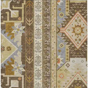 Photo of Brown Beige And Ivory Aztec Washable Indoor Outdoor Area Rug