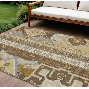 Photo of Brown Beige And Ivory Aztec Washable Indoor Outdoor Area Rug