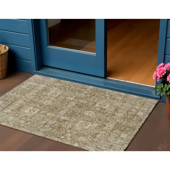 Brown Beige And Ivory Oriental Washable Indoor Outdoor Area Rug Photo 1