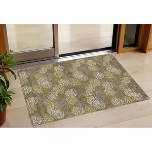 Photo of Brown Beige And Ivory Polka Dot Washable Indoor Outdoor Area Rug