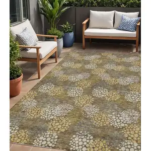 Photo of Brown Beige And Ivory Polka Dot Washable Indoor Outdoor Area Rug