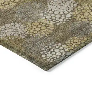 Photo of Brown Beige And Ivory Polka Dot Washable Indoor Outdoor Area Rug