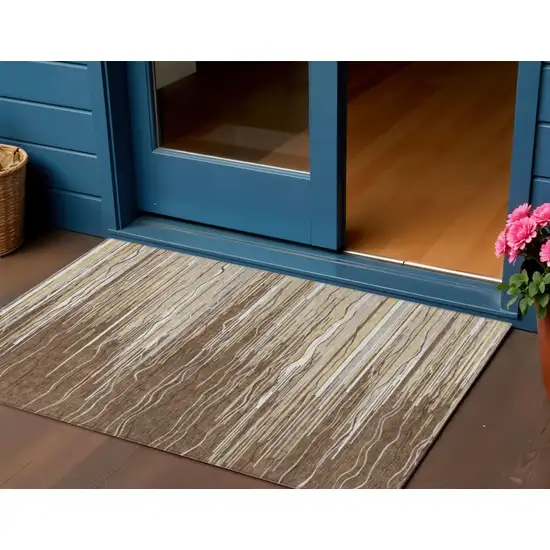Brown Beige And Ivory Striped Washable Indoor Outdoor Area Rug Photo 1