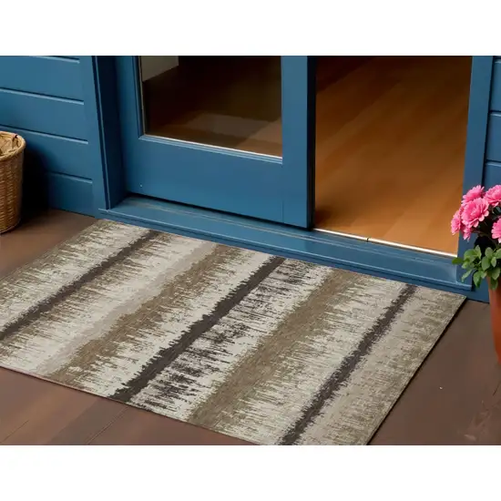 Brown Beige And Ivory Striped Washable Indoor Outdoor Area Rug Photo 1