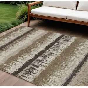 Photo of Brown Beige And Ivory Striped Washable Indoor Outdoor Area Rug