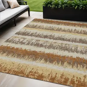 Photo of Brown Beige And Ivory Striped Washable Indoor Outdoor Area Rug