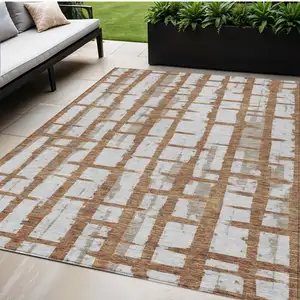 Photo of Brown Beige And Ivory Striped Washable Indoor Outdoor Area Rug
