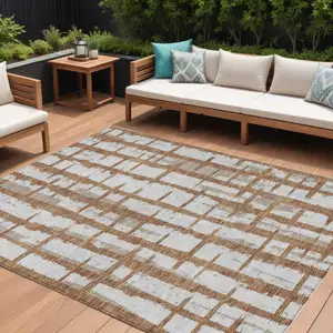 Photo of Brown Beige And Ivory Striped Washable Indoor Outdoor Area Rug