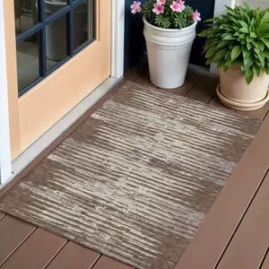 Photo of Brown Beige And Ivory Striped Washable Indoor Outdoor Area Rug