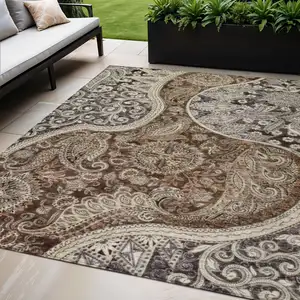 Photo of Brown Beige And Tan Floral Medallion Washable Indoor Outdoor Area Rug