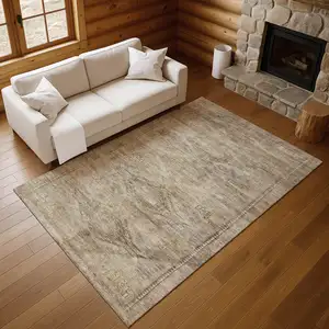 Photo of Brown Beige And Taupe Abstract Geometric Washable Area Rug With UV Protection