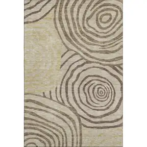 Photo of Brown Beige And Taupe Abstract Washable Area Rug With UV Protection